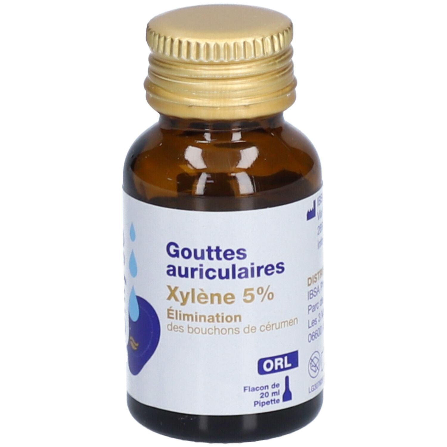 Flacon brun avec bouchon doré. Étiquette: Gouttes auriculaires Xylène 5%. Élimination bouchons de cérumen. Flacon 20 ml.
