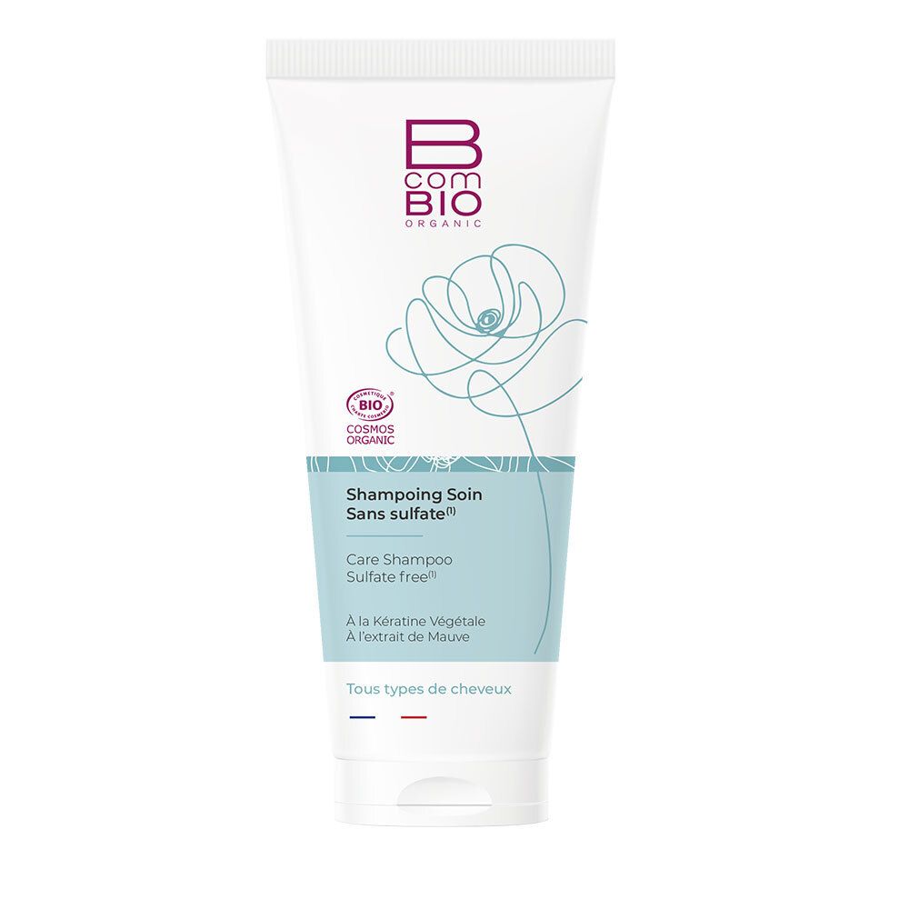 Tube blanc et turquoise. Logo Bcom BIO. "Shampoing Soin Sans sulfate". Certification Cosmos Organic.