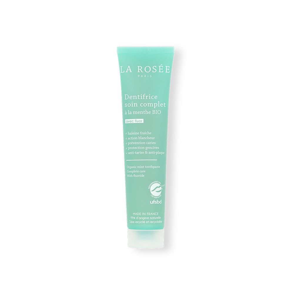 Tube de dentifrice vert. Inscription: LA ROSÉE, Dentifrice soin complet à la menthe BIO. Label Ufsbd.