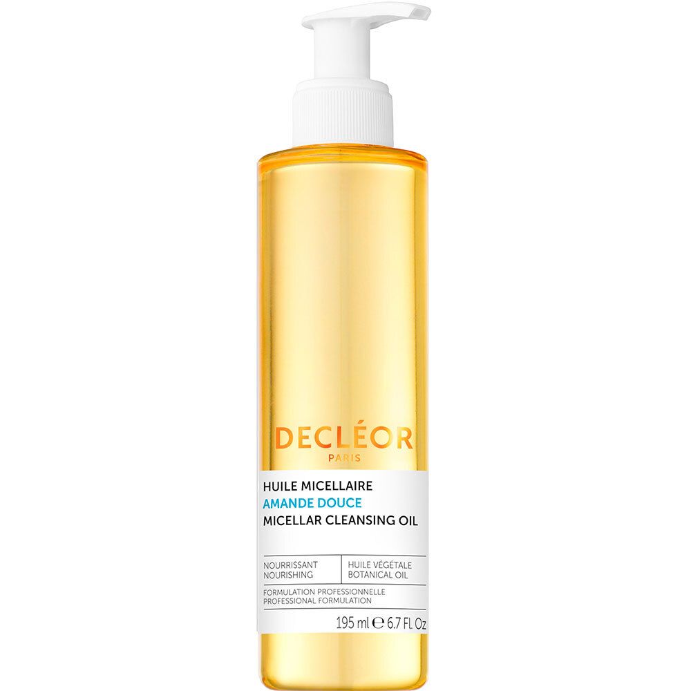Flacon transparent jaune avec pompe blanche. Inscription: DECLÉOR, HUILE MICELLAIRE, AMANDE DOUCE, MICELAR CLEANSING OIL.