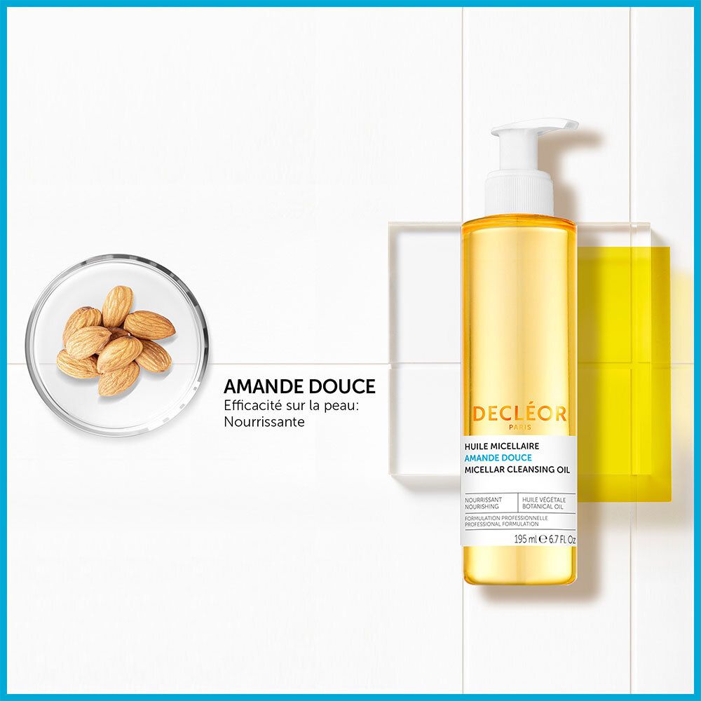 Flacon à côté d'amandes et d'un bloc jaune. Texte: AMANDE DOUCE, Efficacité sur la peau. Nourrissante.