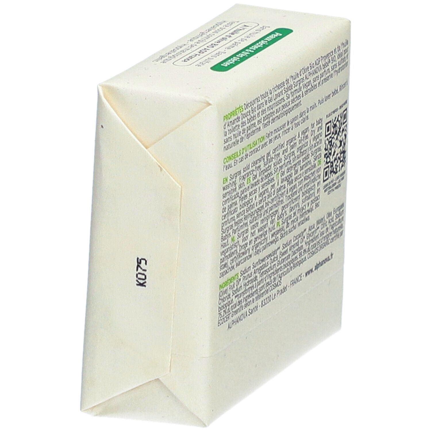 Schrägansicht der Verpackung von Alphanova Bébé Gel Lavant Solide. Text und QR-Code sichtbar.