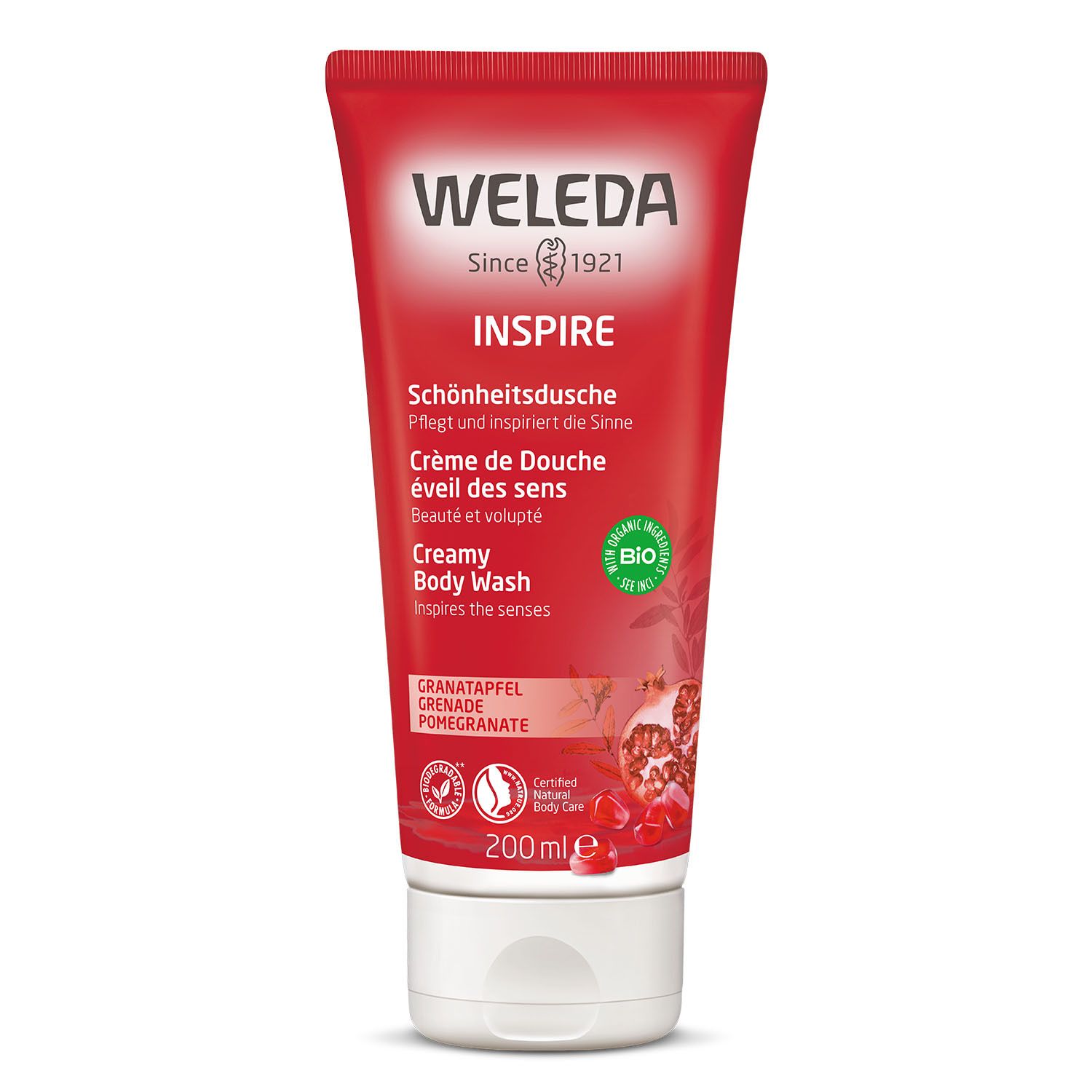 Tube rouge avec texte. Inspire, Crème de Douche, Creamy Body Wash. Illustration de grenade. Logo bio et certifications.