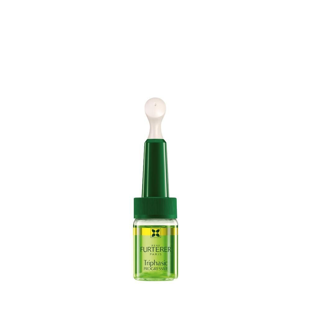 Flacon vert avec applicateur. Contient du liquide. Inscription: Triphasic Progressive.
