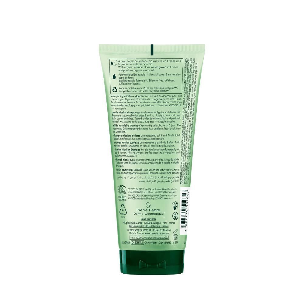 Rückseite der grünen Shampoo-Tube. Text in mehreren Sprachen. Informationen zu Inhaltsstoffen und Zertifizierungen.