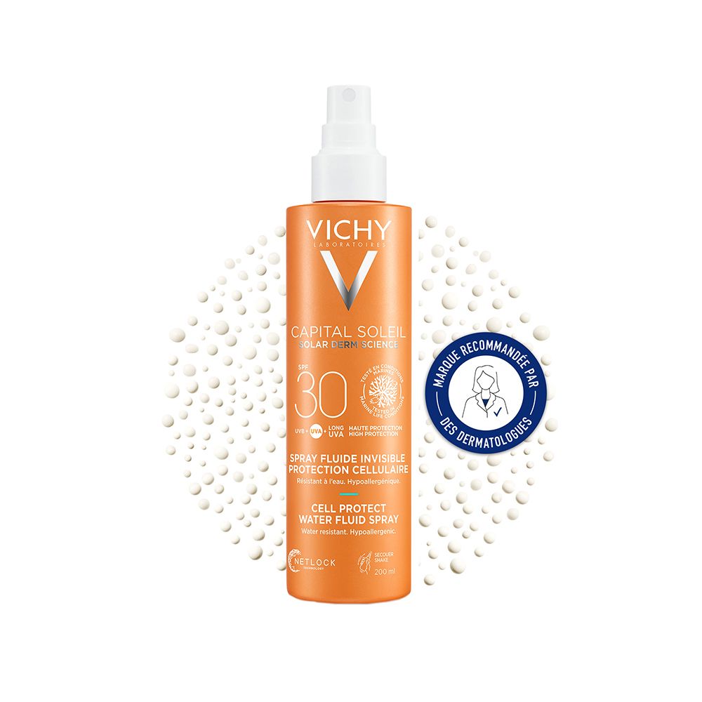 Flacon orange avec vaporisateur blanc. Texte: VICHY, CAPITAL SOLEIL, SPF 30. Recommandé par les dermatologues.