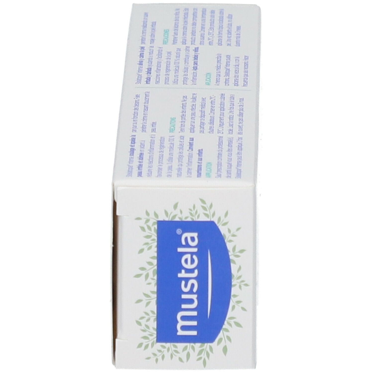 Produktverpackung, Seitenansicht. Aufschrift: mustela. Grüne Blätter. Weiße Verpackung.