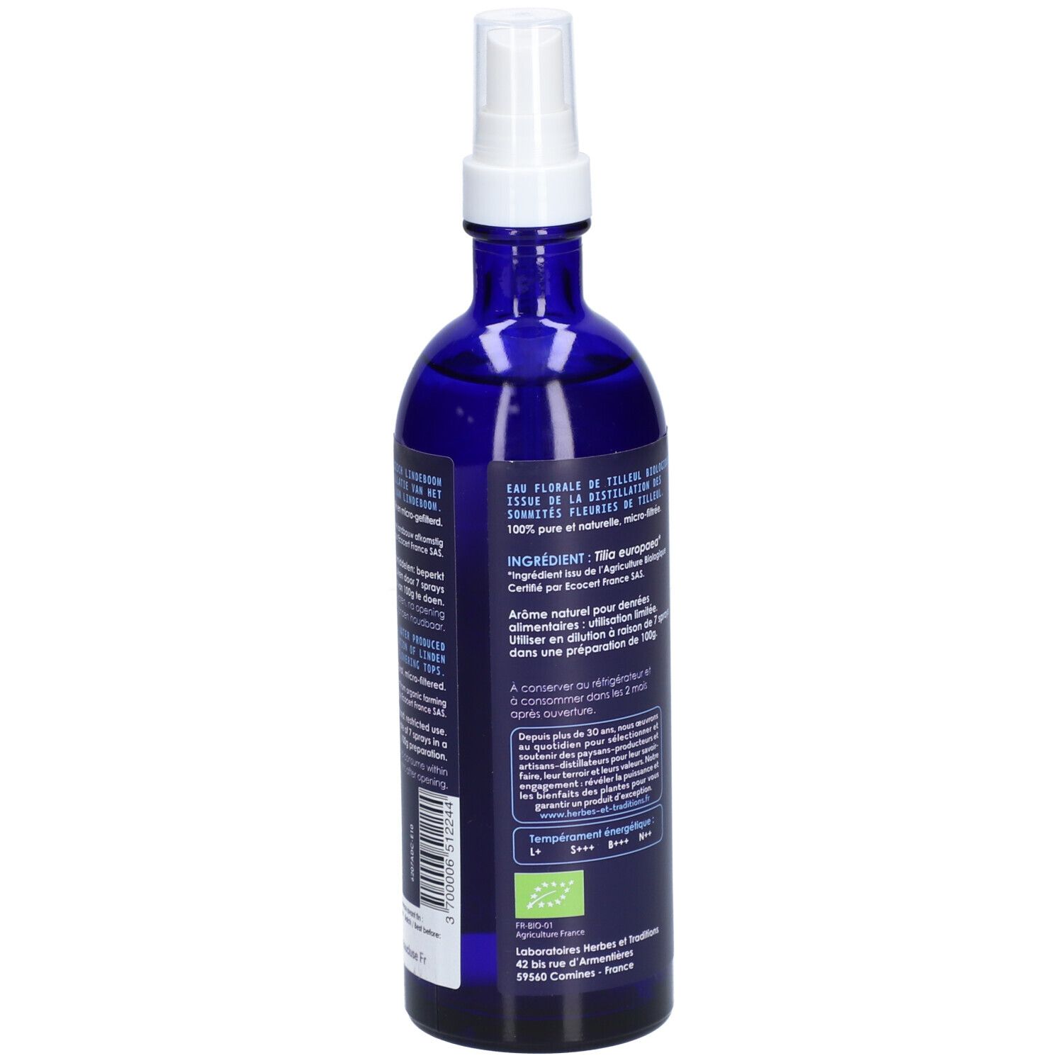 Dos d'un flacon en verre bleu avec vaporisateur blanc. Étiquette avec texte et label bio.