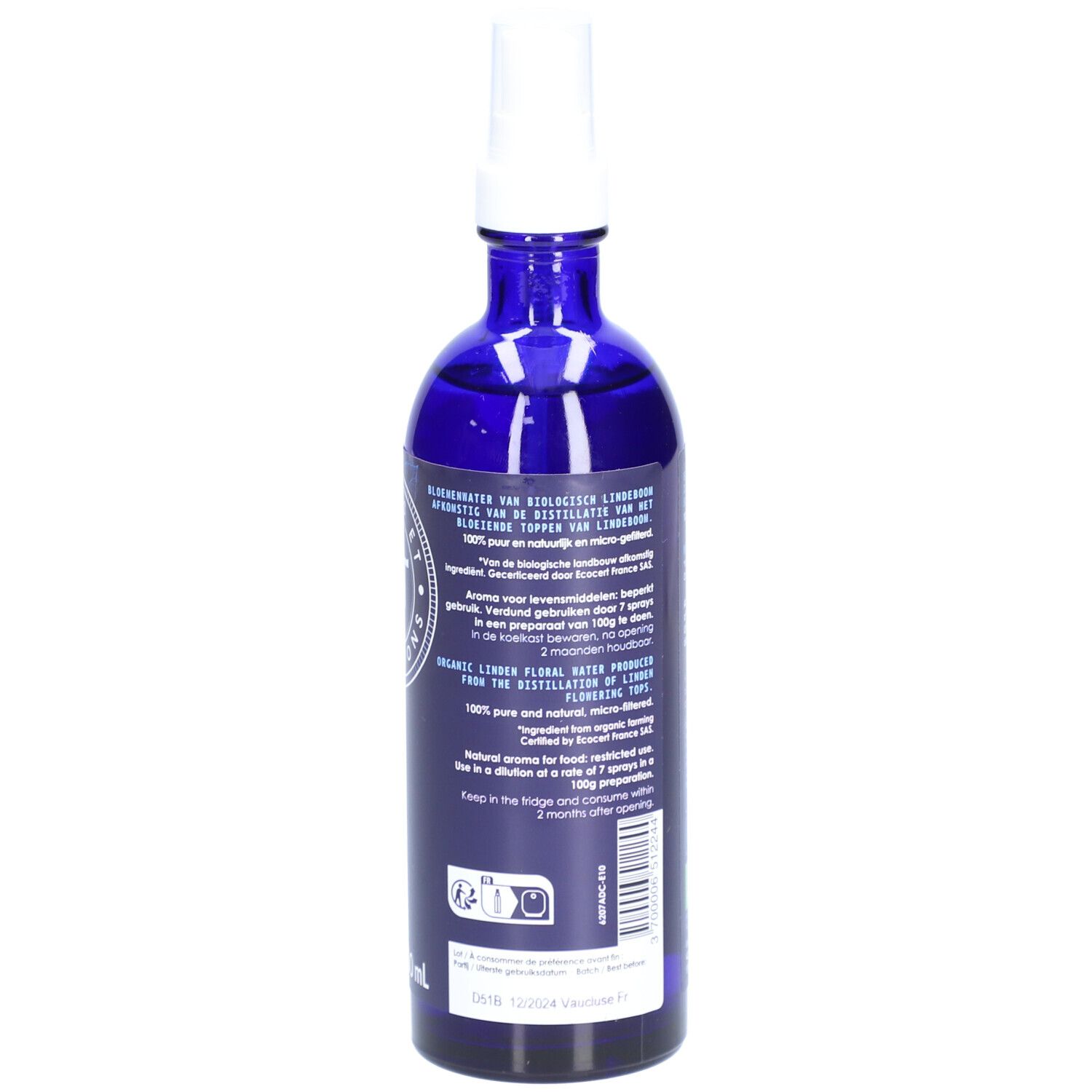 Dos d'un flacon en verre bleu avec vaporisateur blanc. Étiquette avec texte et label bio.
