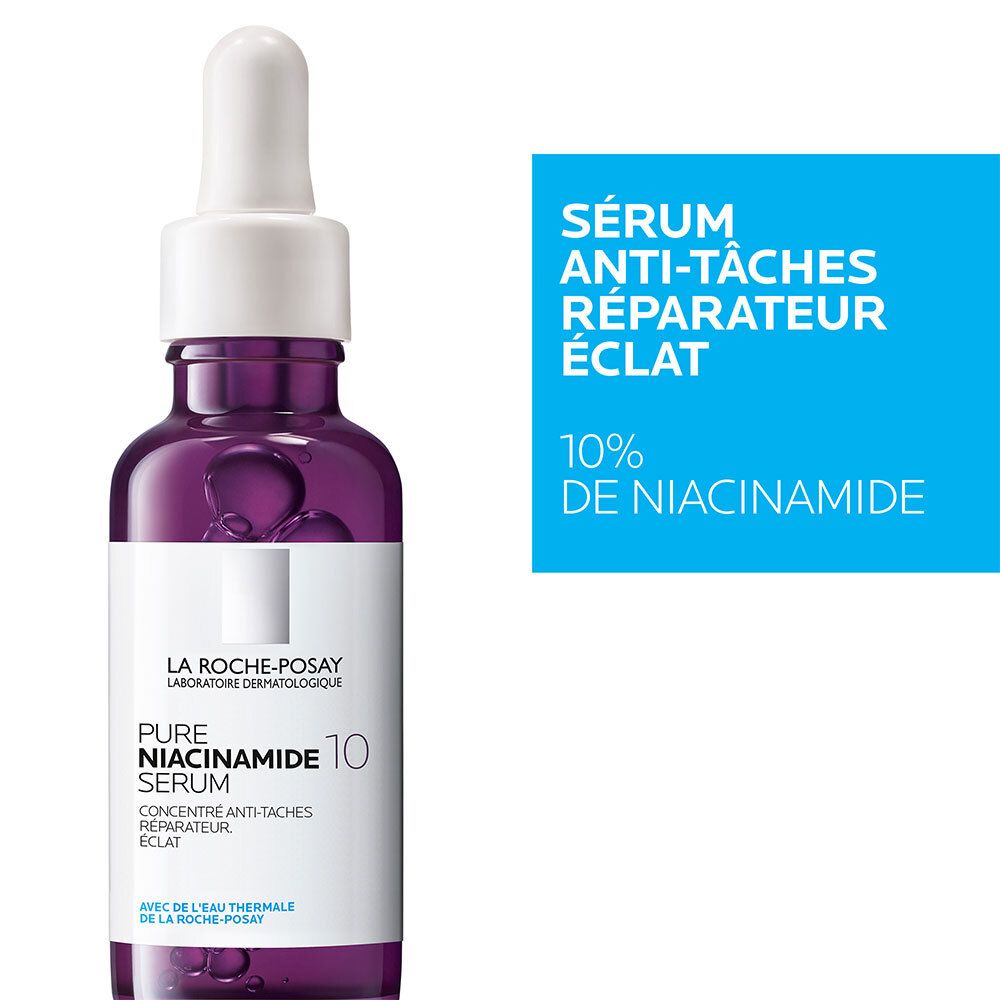 Flacon violet avec pipette et bannière bleue. Inscription: Sérum anti-taches, 10% de Niacinamide.