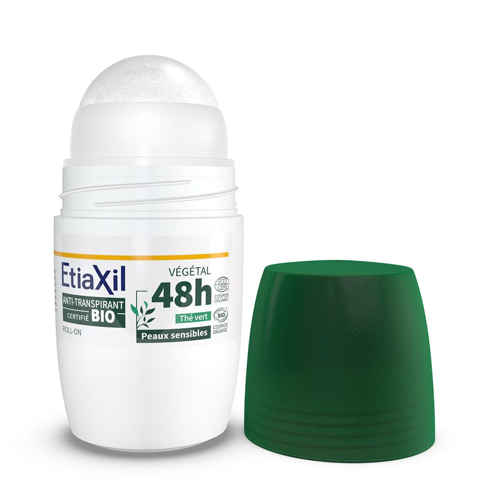Déodorant roll-on avec bouchon vert ouvert. Contenant blanc. Texte: Anti-transpirant 48h, BIO, Thé vert.