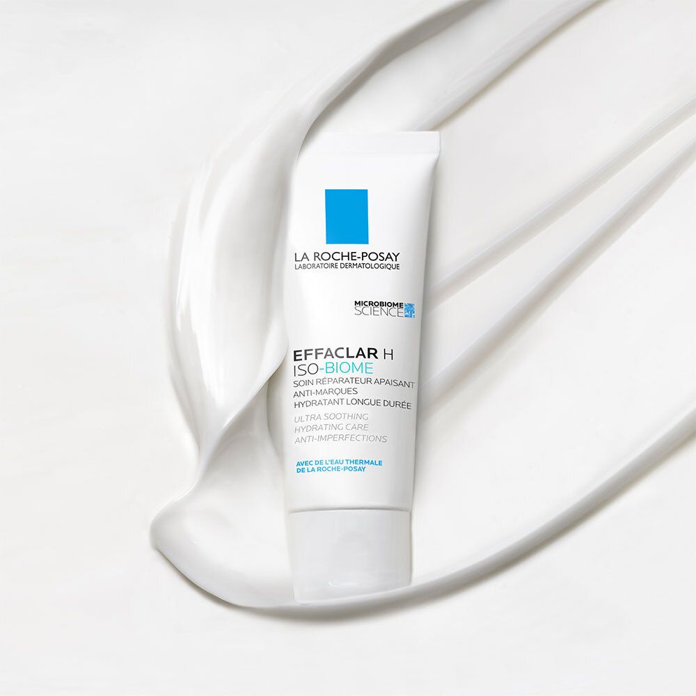 Tube blanc avec marque bleue. Texte: La Roche-Posay, Effaclar H Iso-Biome. Sur fond blanc.