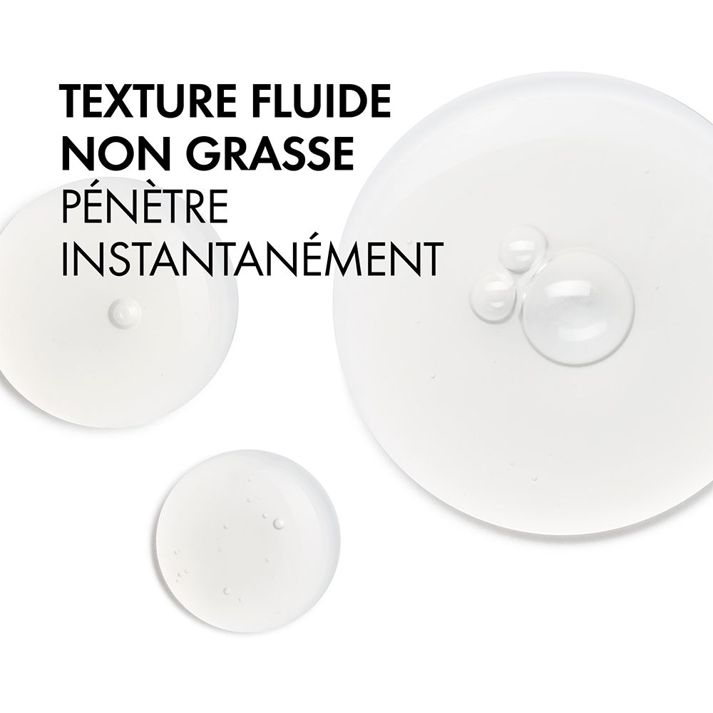 Texte: Texture fluide non grasse pénètre instantanément. Texture fluide, non grasse, pénètre instantanément.