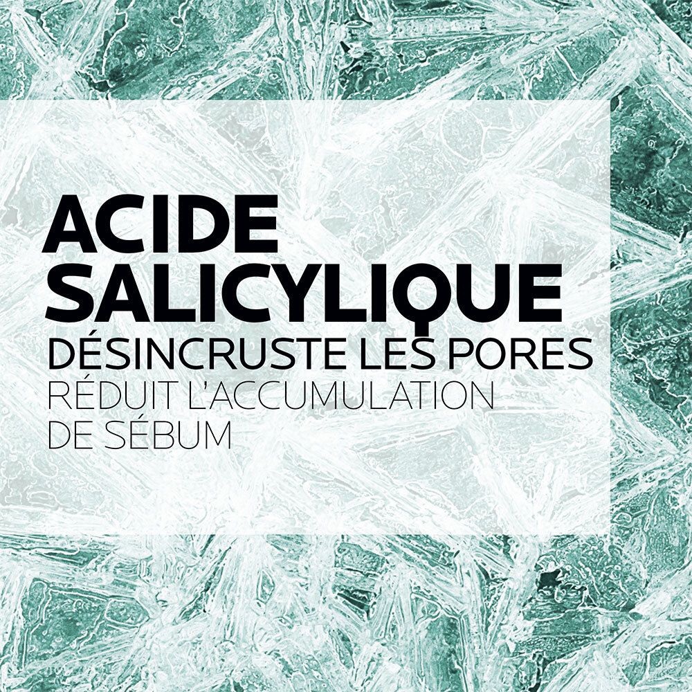 Texte sur fond glacé. Texte: Acide Salicylique, désincruste les pores, réduit l'accumulation de sébum.