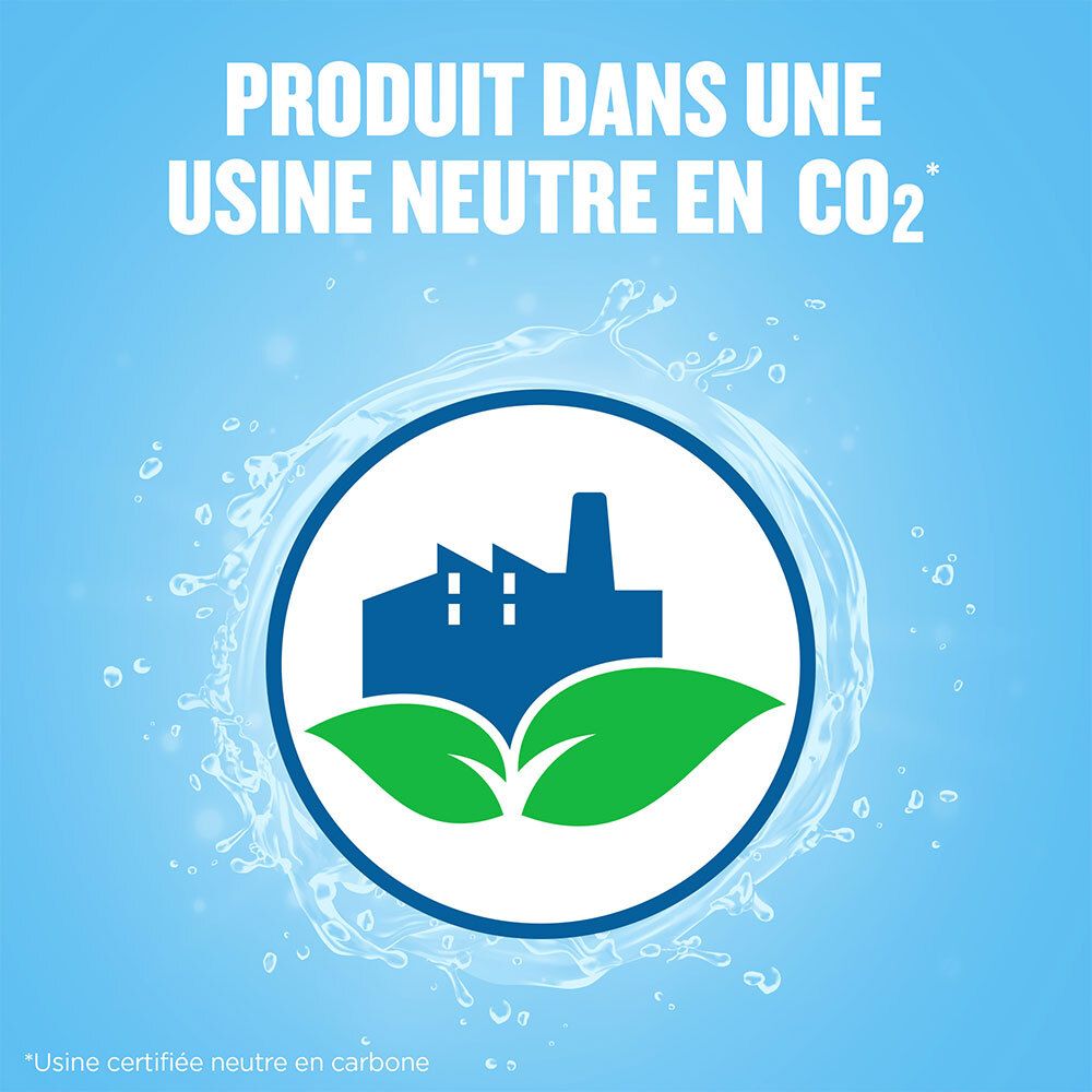 Kreisförmiges Logo mit Fabrik und Blättern. Text: Produkt in einer CO2-neutralen Fabrik. Marke LISTERINE.