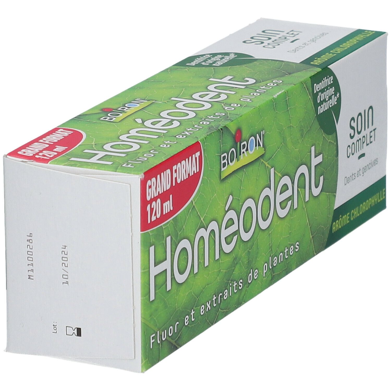 Emballage de soin dentaire. Logo "Homeodent", "Grand Format 120 ml". Vert et blanc. Texte: Fluor et extraits de plantes. Date.
