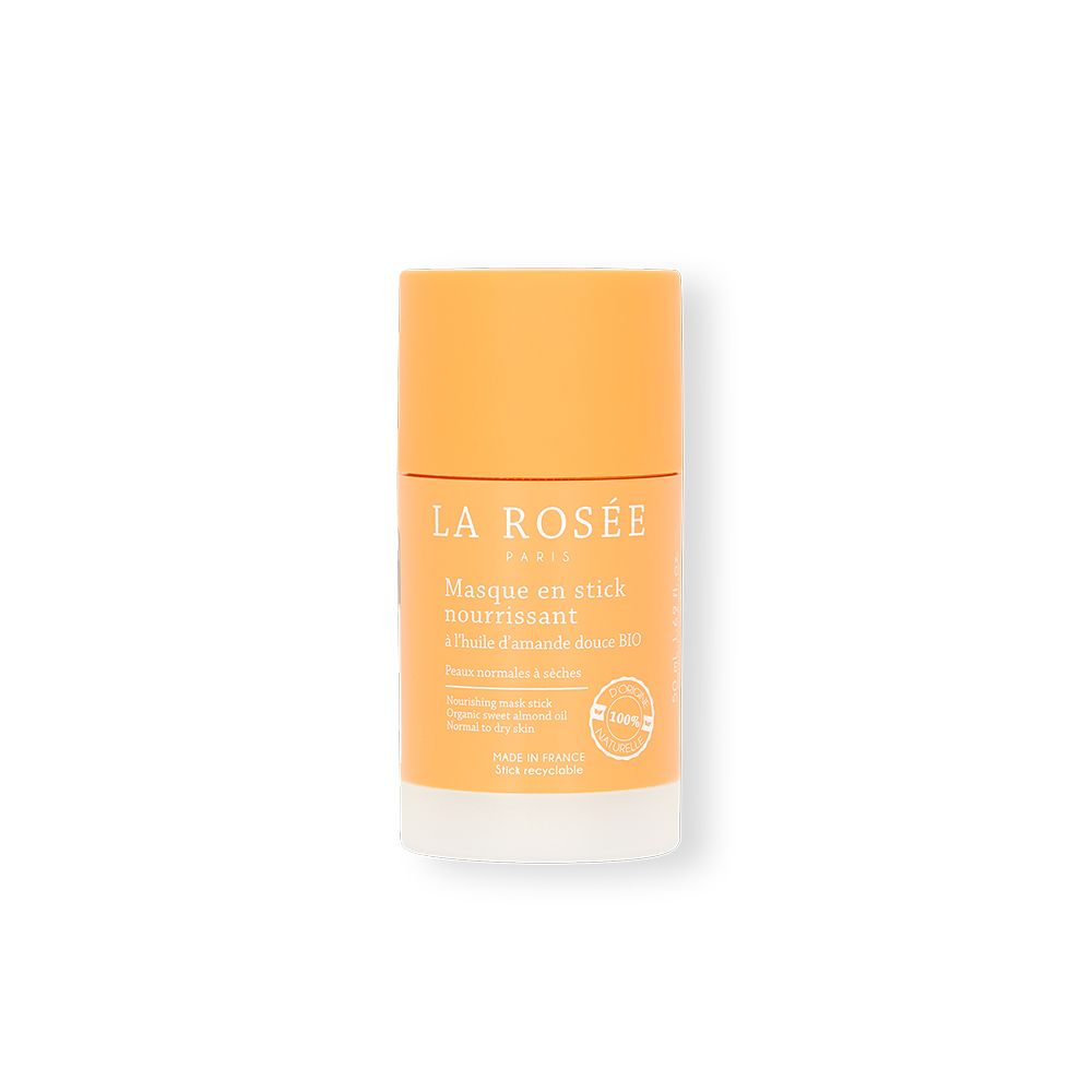 Masque en stick cylindrique, couvercle orange, base blanche. Inscription: La Rosée, Masque en stick nourrissant.