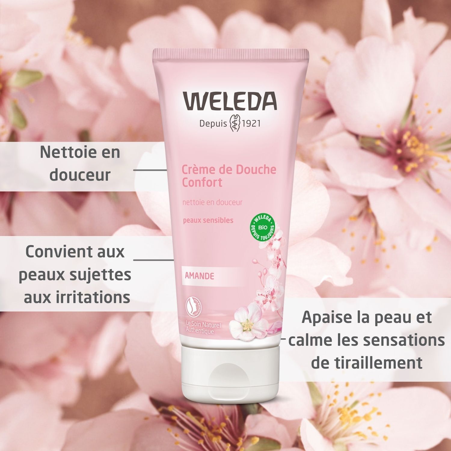 Tube rose "WELEDA" avec "Crème de Douche Confort". Inscriptions : "Nettoie en douceur", "Convient aux peaux sujettes aux irritations".