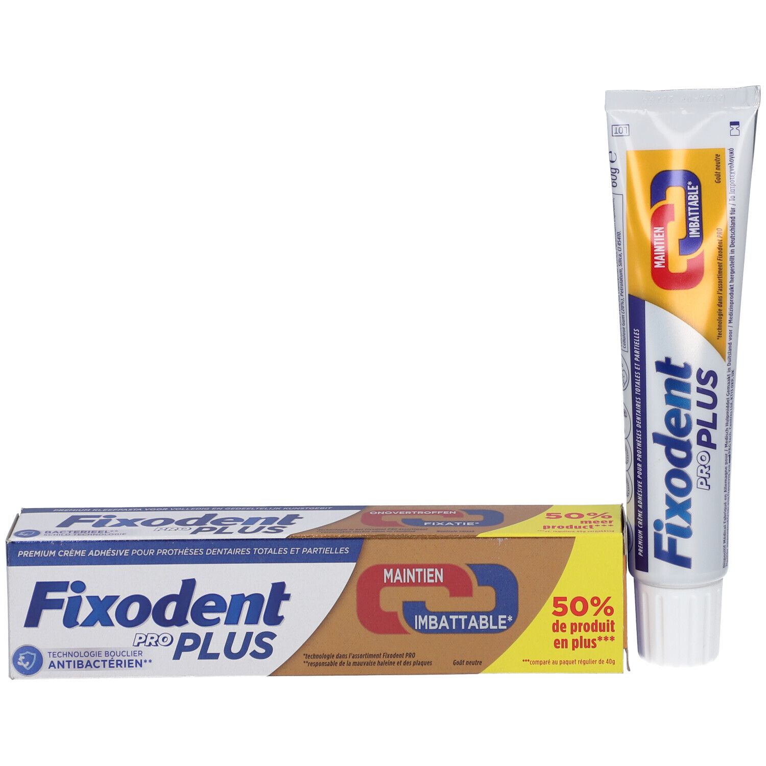 Emballage et tube de crème adhésive. Emballage : marron, bleu, blanc. Tube : blanc, bleu, jaune, rouge. Inscription : Fixodent Pro Plus.