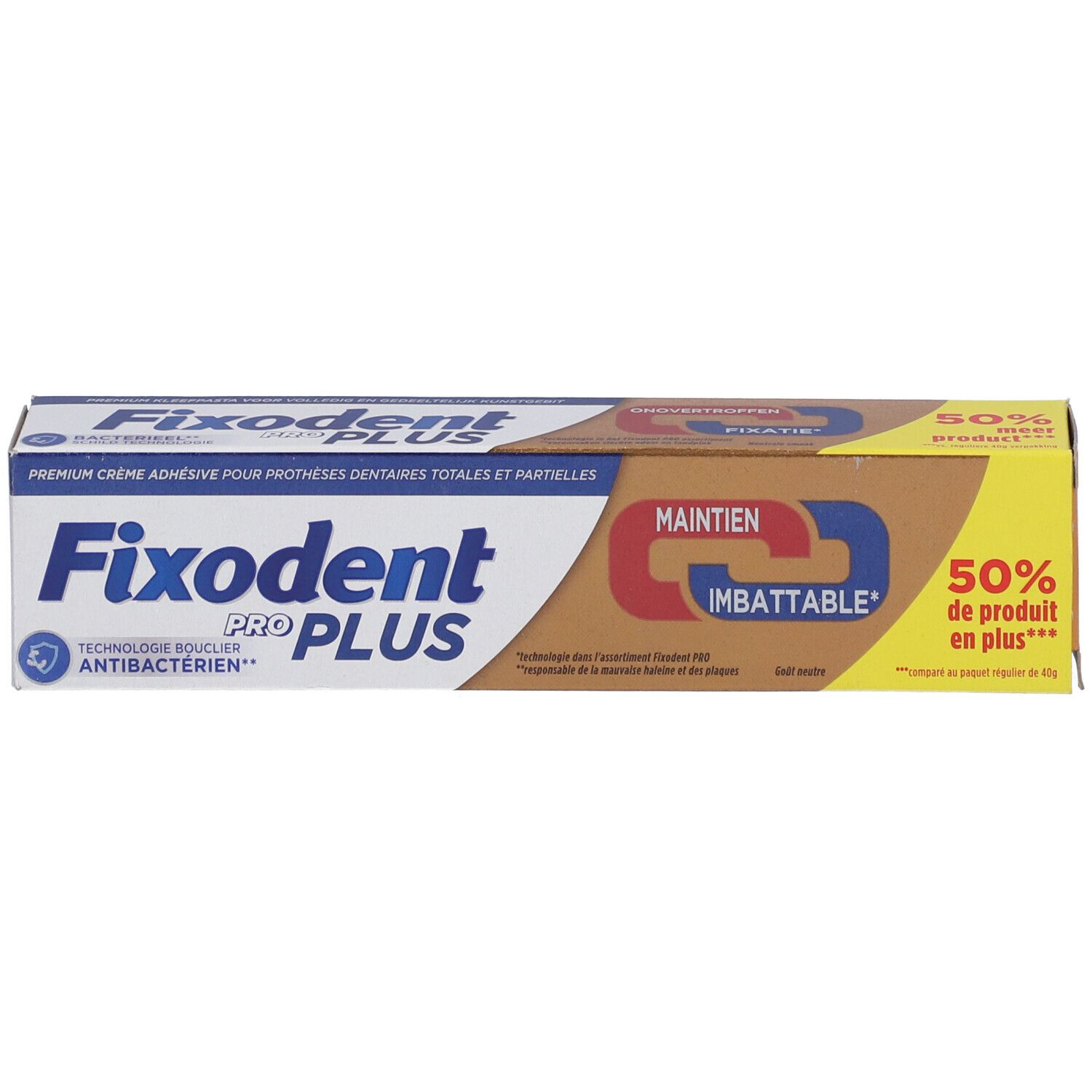 Emballage du produit. Marron, bleu, blanc. Inscriptions : Fixodent Pro Plus, Maintien Imbattable. Avec 50% de produit en plus.