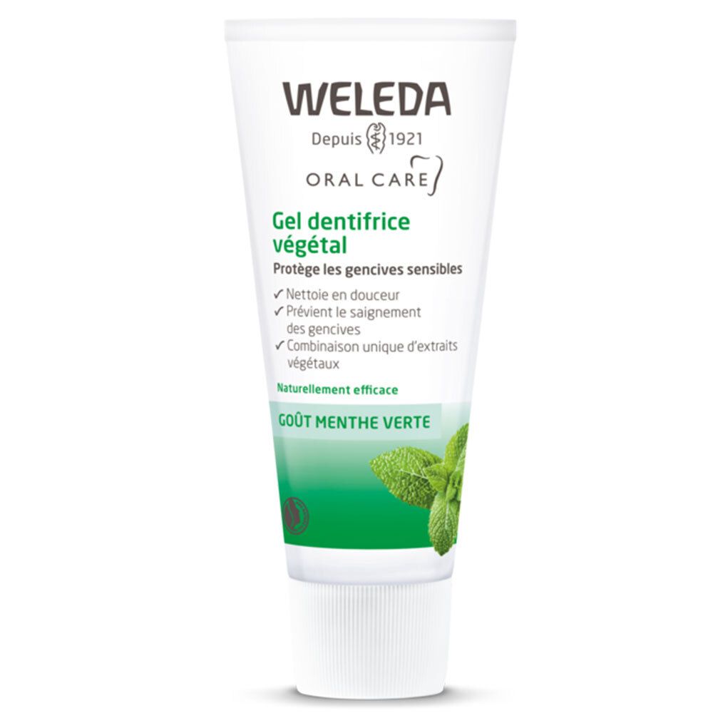 Zahngel-Tube mit Text: Weleda, Oral Care, Gel dentifrice végétal. Grün-weiße Verpackung, Minzblatt.