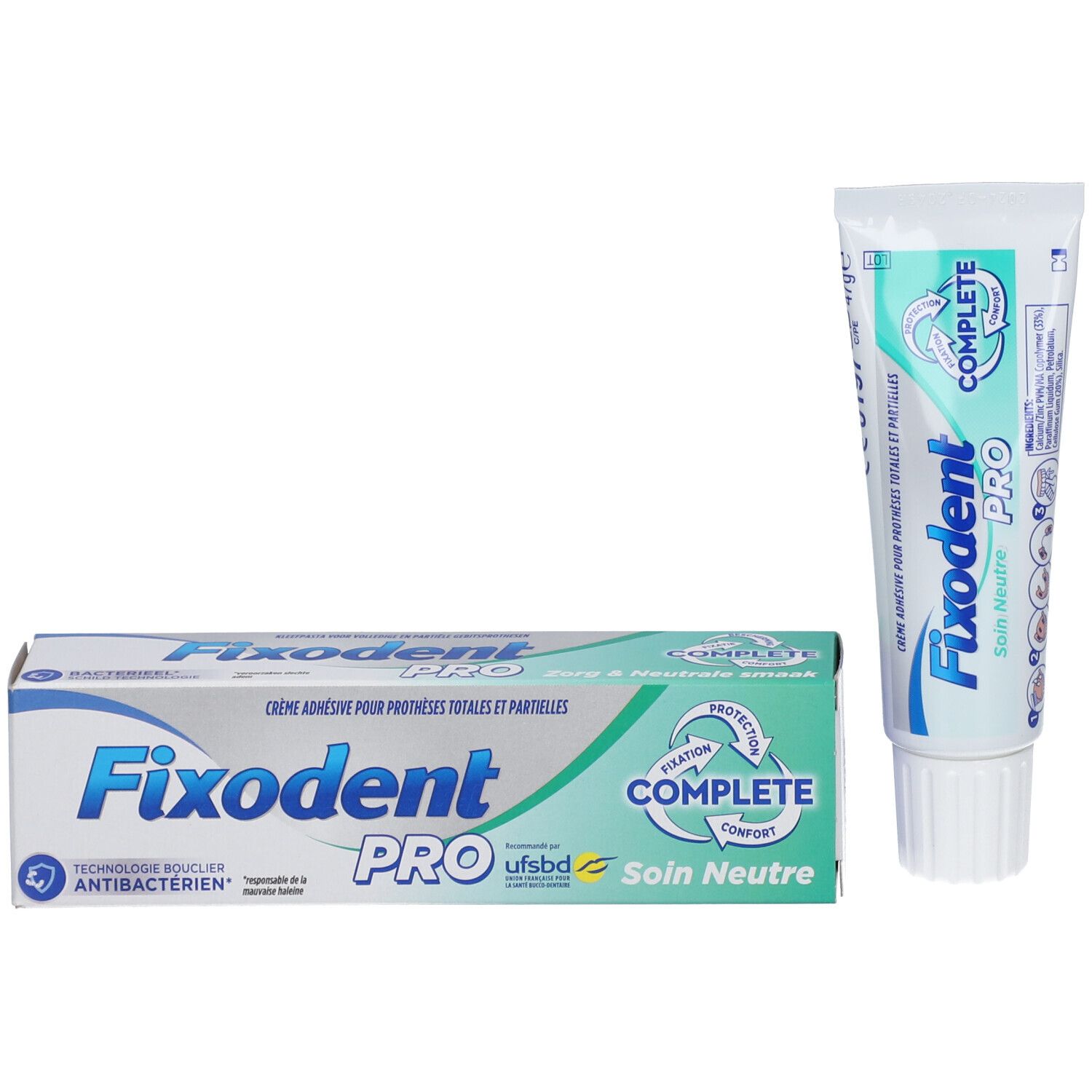Fixodent Pro crème adhésive et emballage. Boîte et tube. Boîte avec nom du produit et inscription "Soin Neutre".