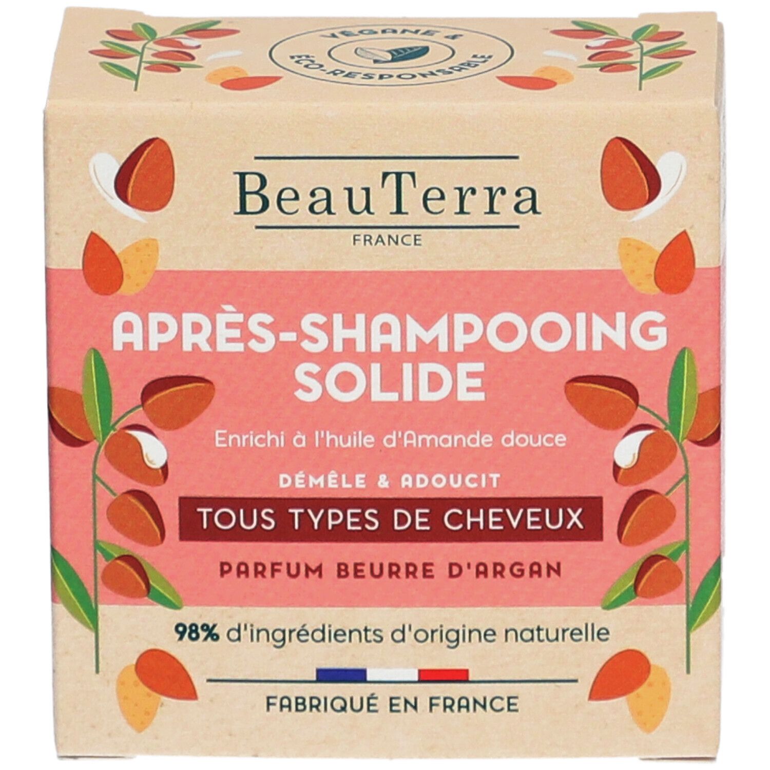 Kartonnen verpakking met productinfo. Opschrift: BeauTerra, Après-Shampooing Solide, Tous Types de Cheveux, Parfum Beurre d'Argan. 98% natuurlijk.