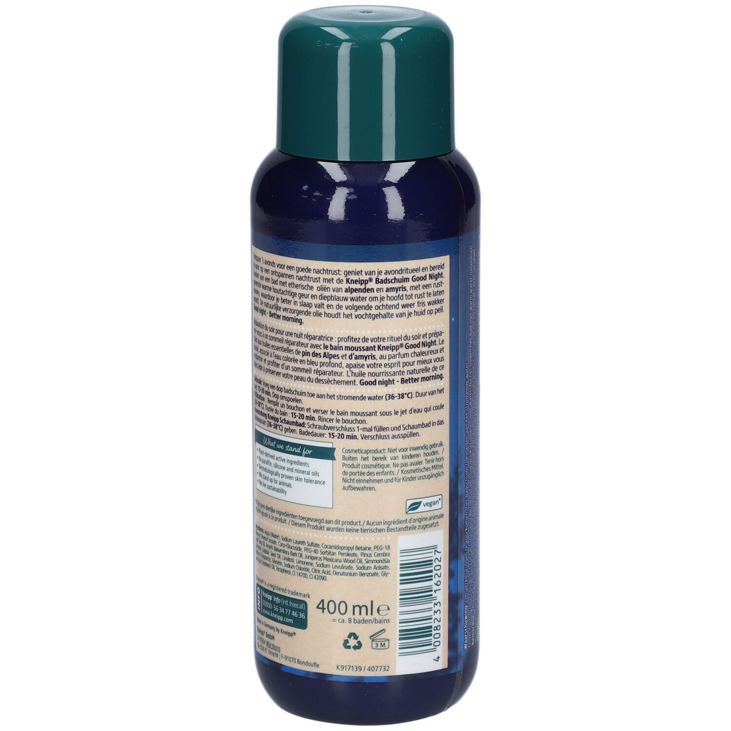 Flacon bleu avec bouchon vert. Inscription: 400 ml. Texte sur le côté. Illustration: Rondin de bois, branche de pin.