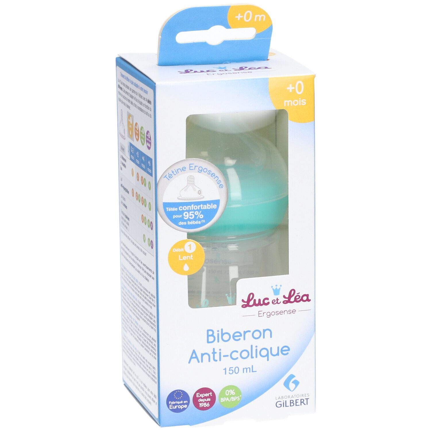 Biberon anti-colique dans son emballage. Tétine turquoise, biberon transparent. Inscription: Biberon Anti-colique, 150 ml.