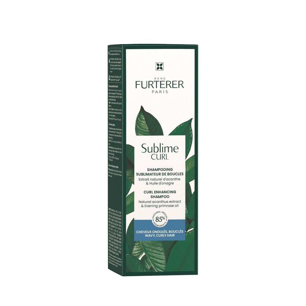Karton mit grünen Blättern. René Furterer SUBLIME CURL Locken-Shampoo. Text auf der Verpackung.