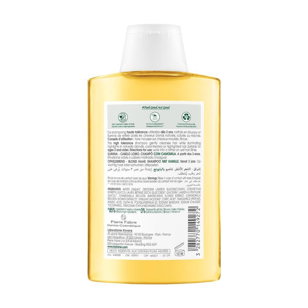 Dos du flacon de shampooing. Texte multilingue. Ingrédients et informations d'utilisation. Symbole 12M.