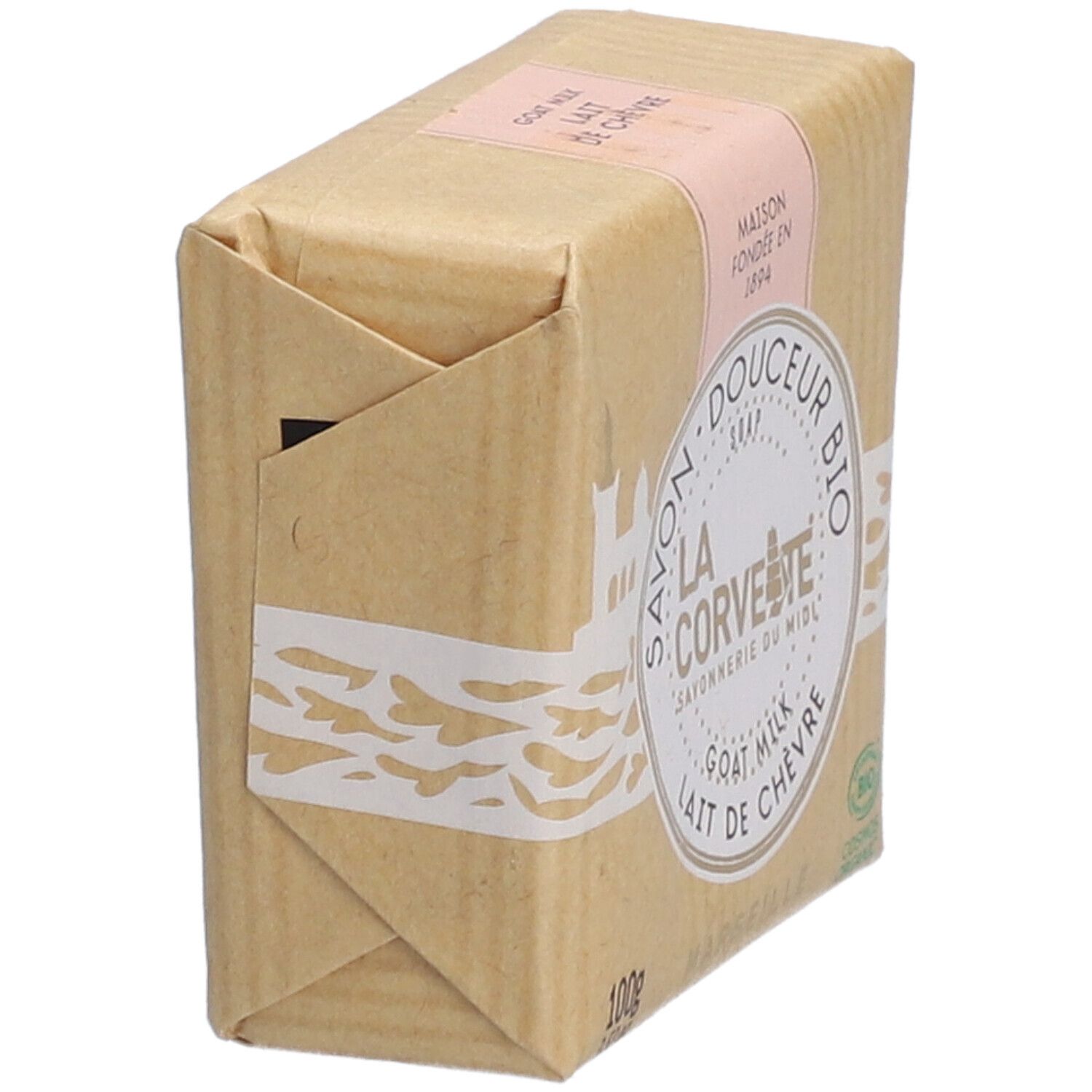 Seife in Papier verpackt. Aufschrift: LA CORVETTE, Ziegenmilch, BIO. Ansicht von der Seite.