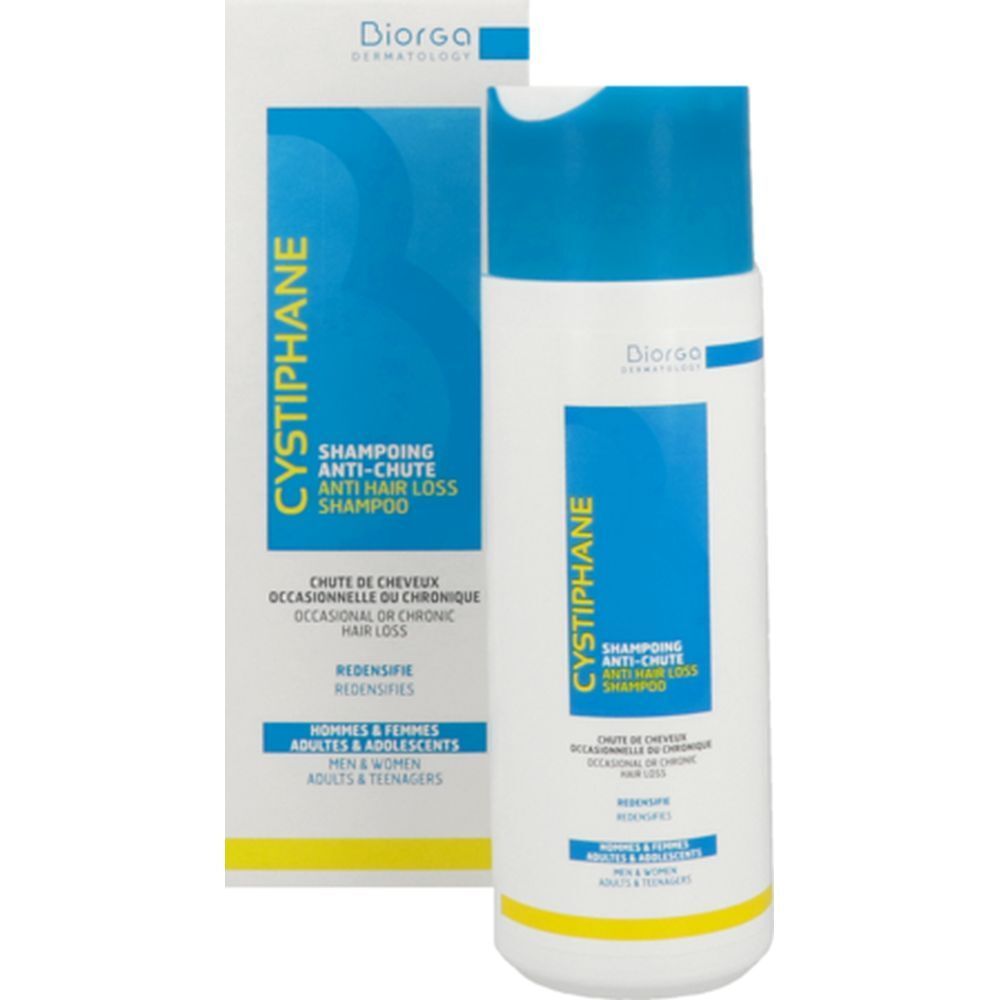 Flacon de shampooing et emballage. Texte : Cystiphane, Shampooing antichute. Marque : Diorga. Pour hommes, femmes et adolescents.