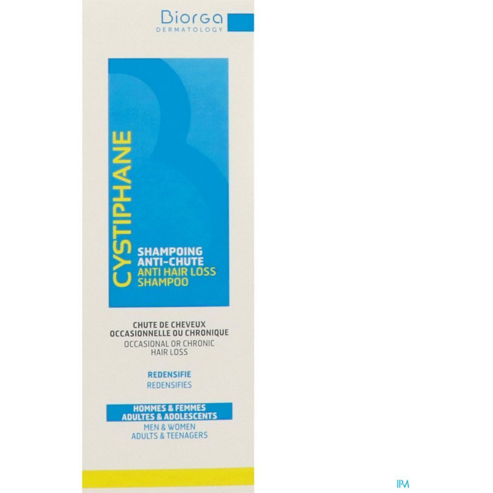 Emballage avec étiquette de shampooing. Texte : Cystiphane, Shampooing antichute. Marque : Diorga. Pour hommes, femmes et adolescents.