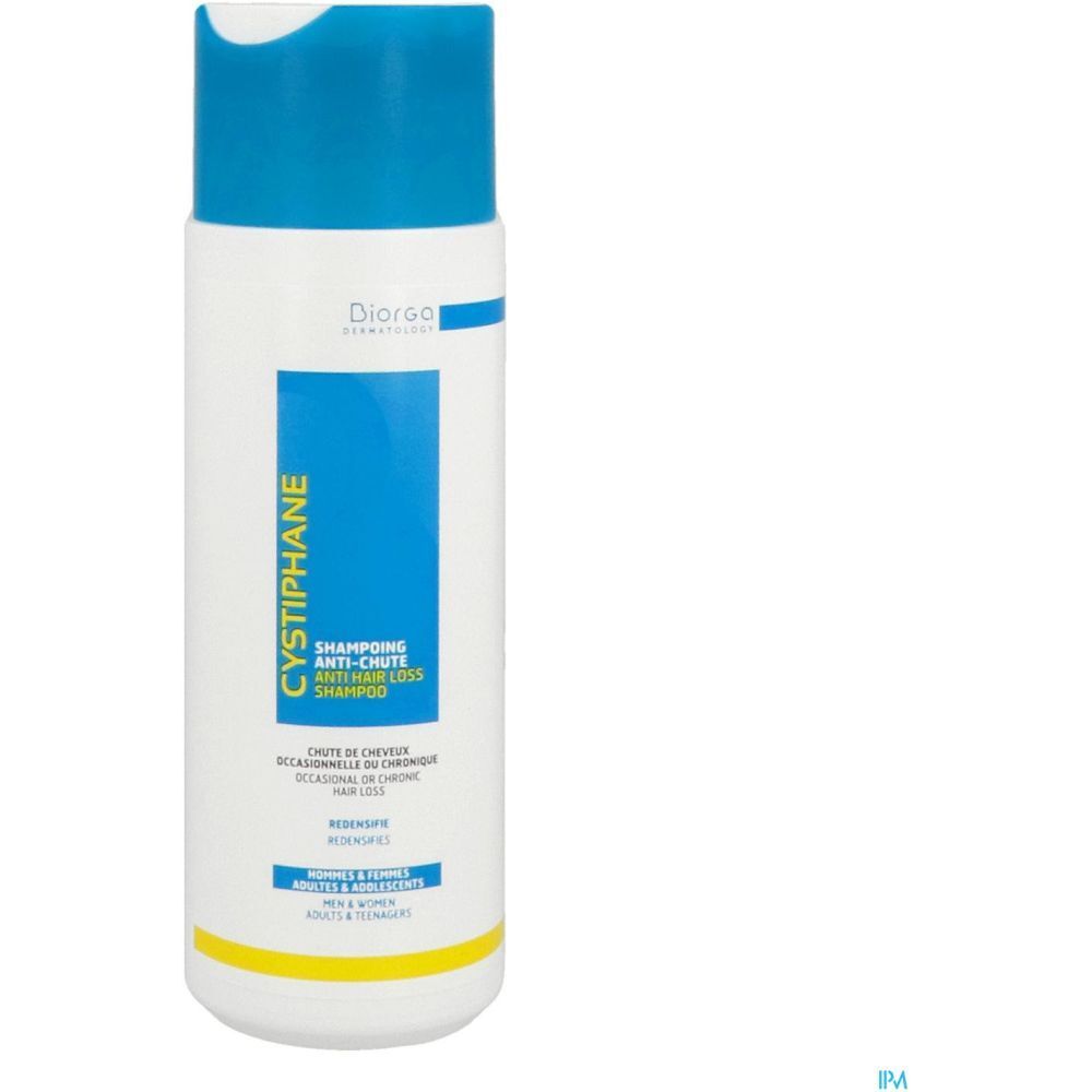 Flacon blanc et bleu avec étiquette de shampooing. Texte : Cystiphane, Shampooing antichute. Marque : Diorga.