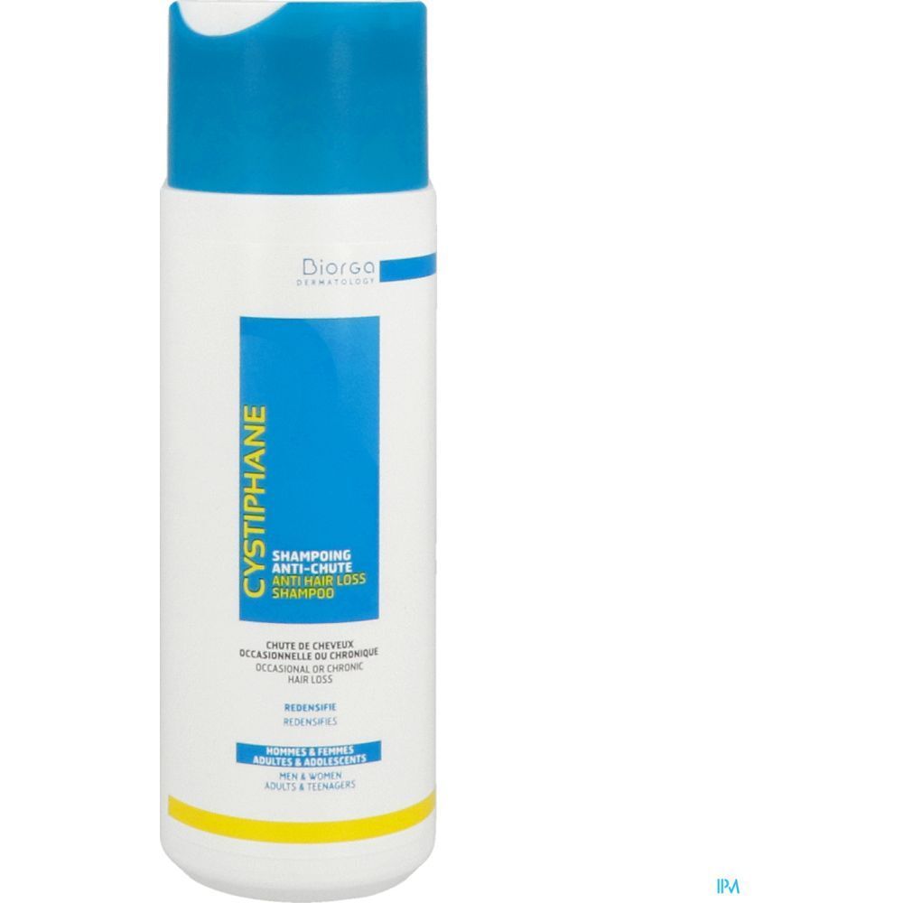 Flacon blanc et bleu avec étiquette de shampooing. Texte : Cystiphane, Shampooing antichute. Marque : Diorga.