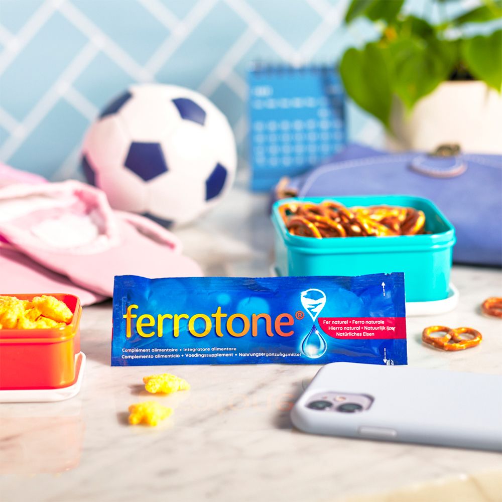 Beutel ferrotone® Original, Snackboxen, Handy, Spielzeug. Auf Tisch.