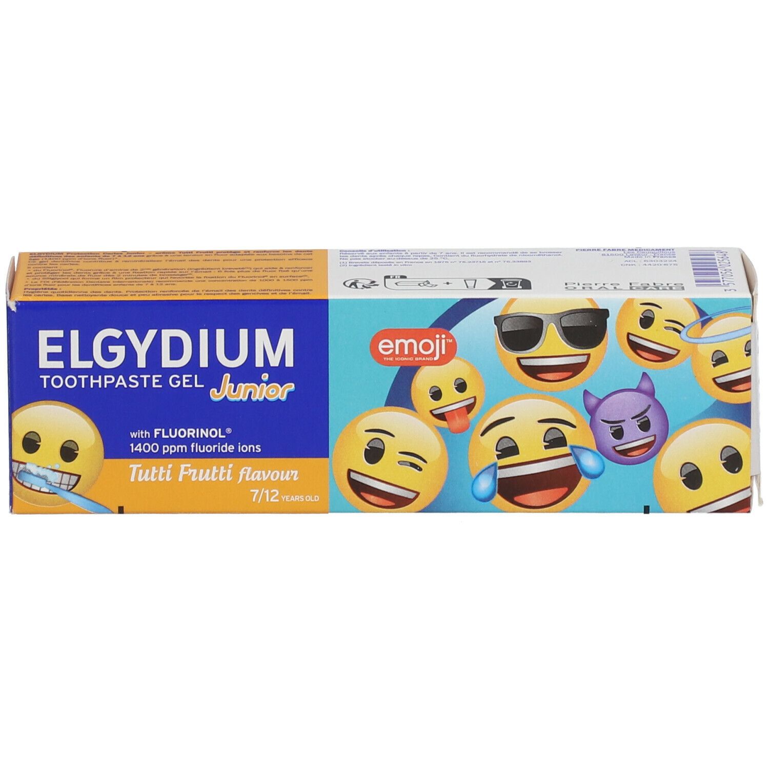 Emballage de gel dentifrice avec motifs emoji. Boîte bleue et jaune avec nom du produit et indication d'âge.