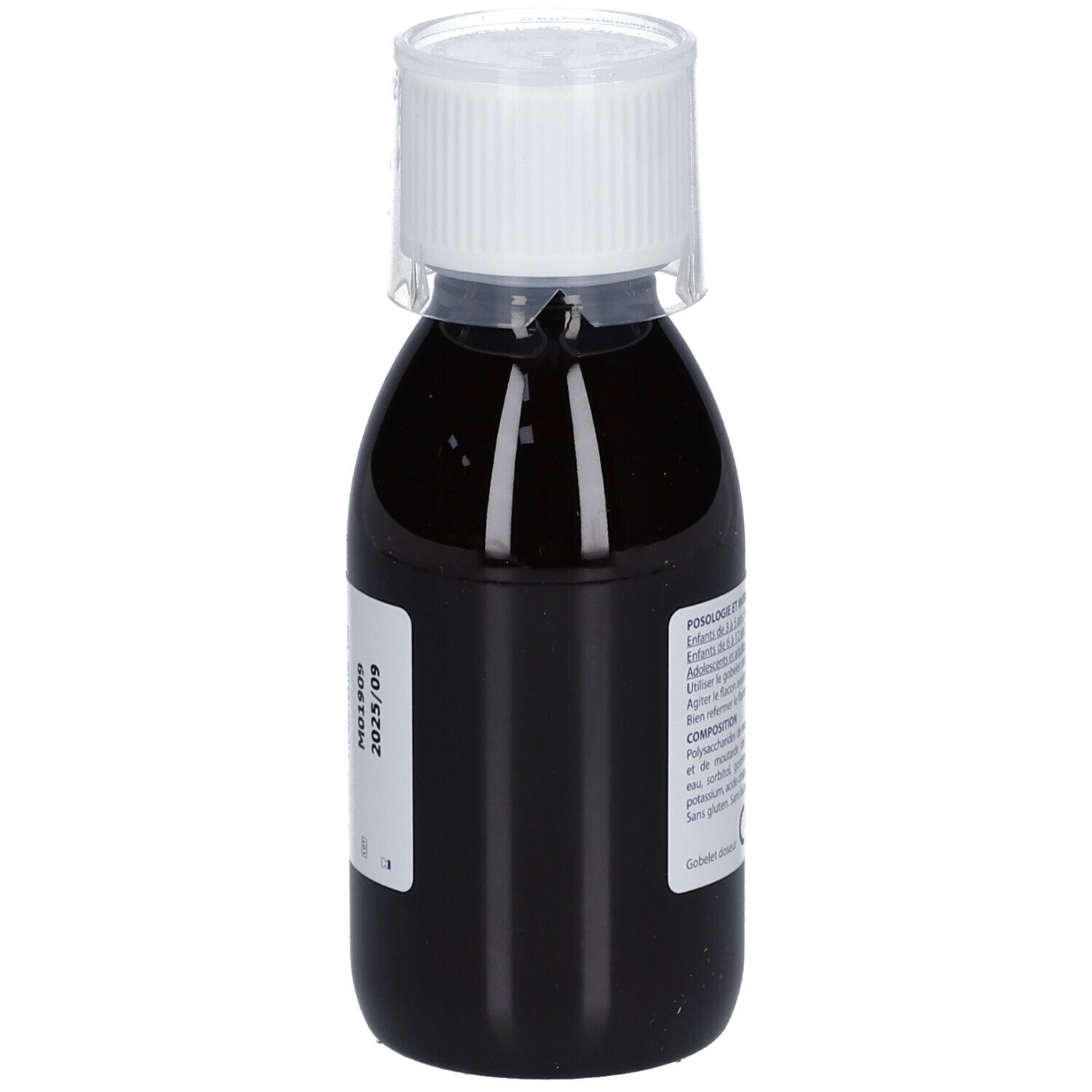 Gros plan d'un flacon de liquide brun. Inscription: Clariver. Date de péremption. Marquage CE.