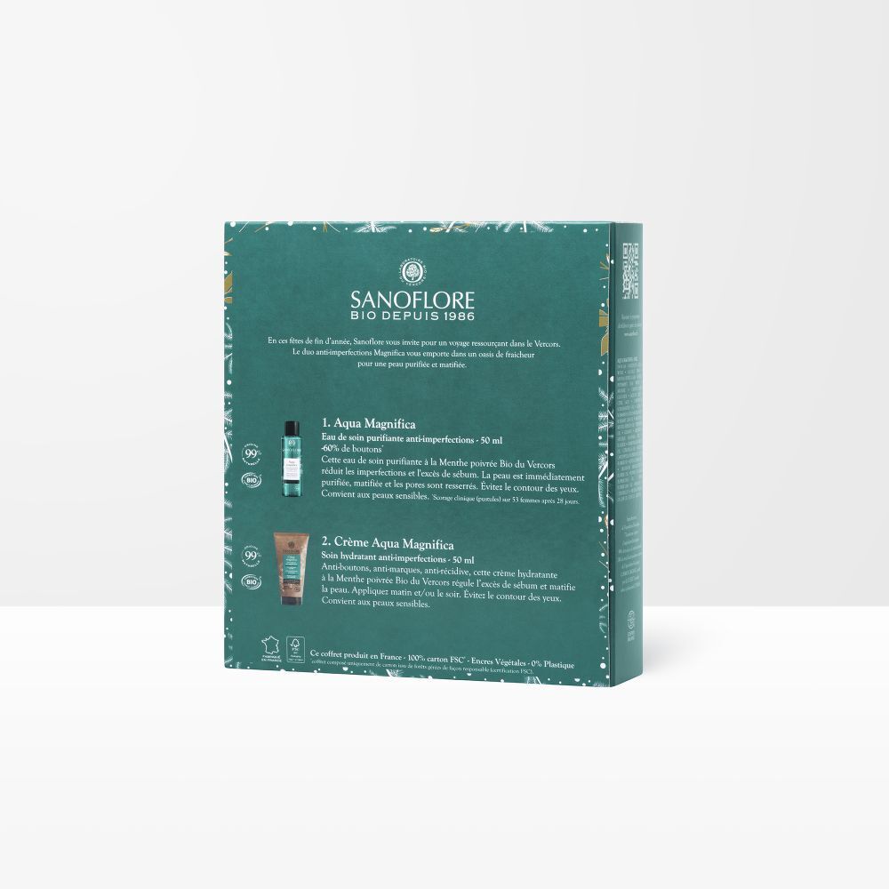 Dos du coffret cadeau. Texte avec informations sur les produits. Aqua Magnifica et Crème Aqua Magnifica. Logo de la marque.
