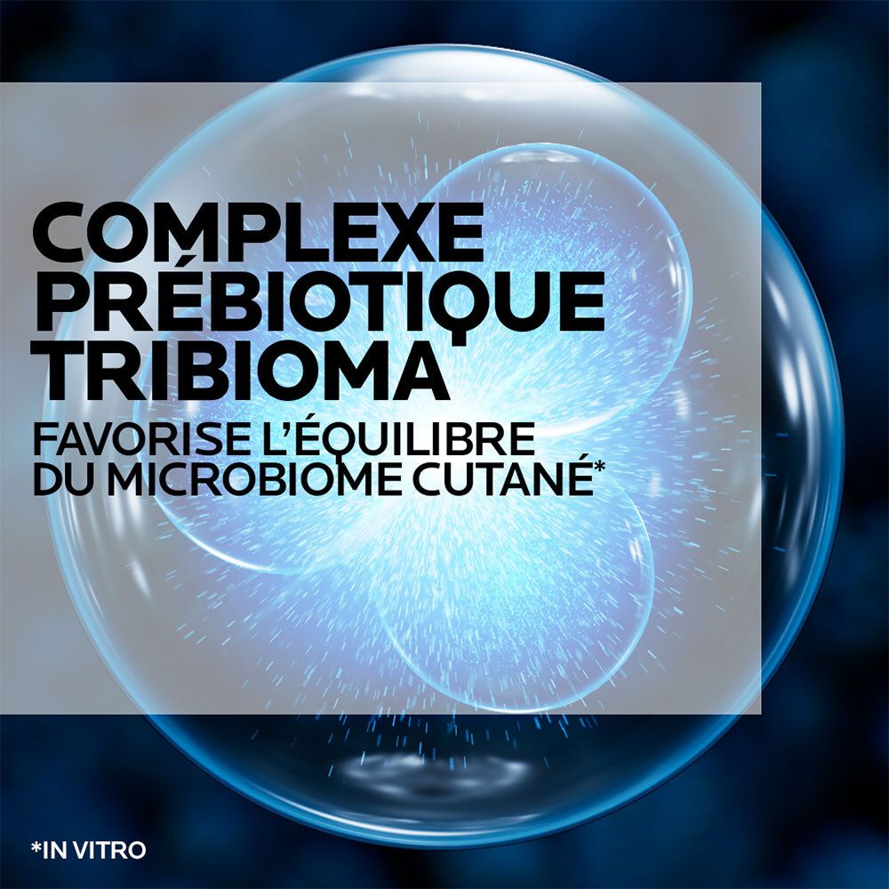 Image bleue avec bulles. Texte : Complexe prébiotique Tribioma. Favorise l'équilibre du microbiome cutané.