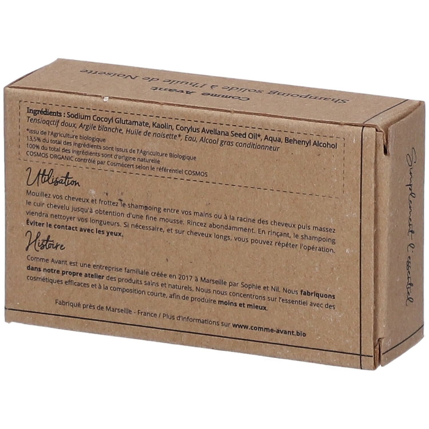 Dos de la boîte en carton avec ingrédients et instructions d'utilisation du shampooing solide à l'huile de noisette.