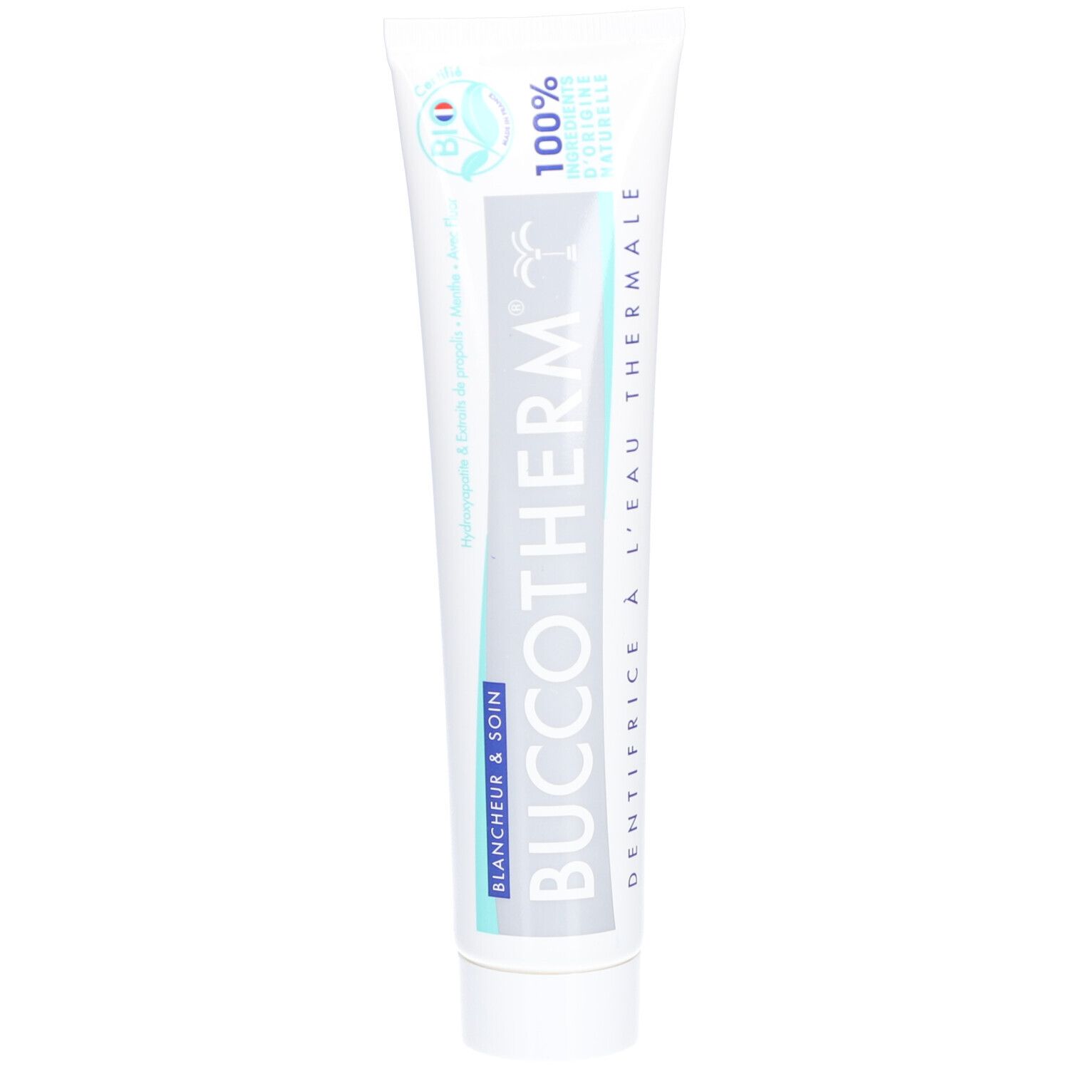Tube de dentifrice blanc. Inscription: Buccotherm, Blancheur & Soin, Dentifrice à l'Eau Thermale. 100% d'origine naturelle.