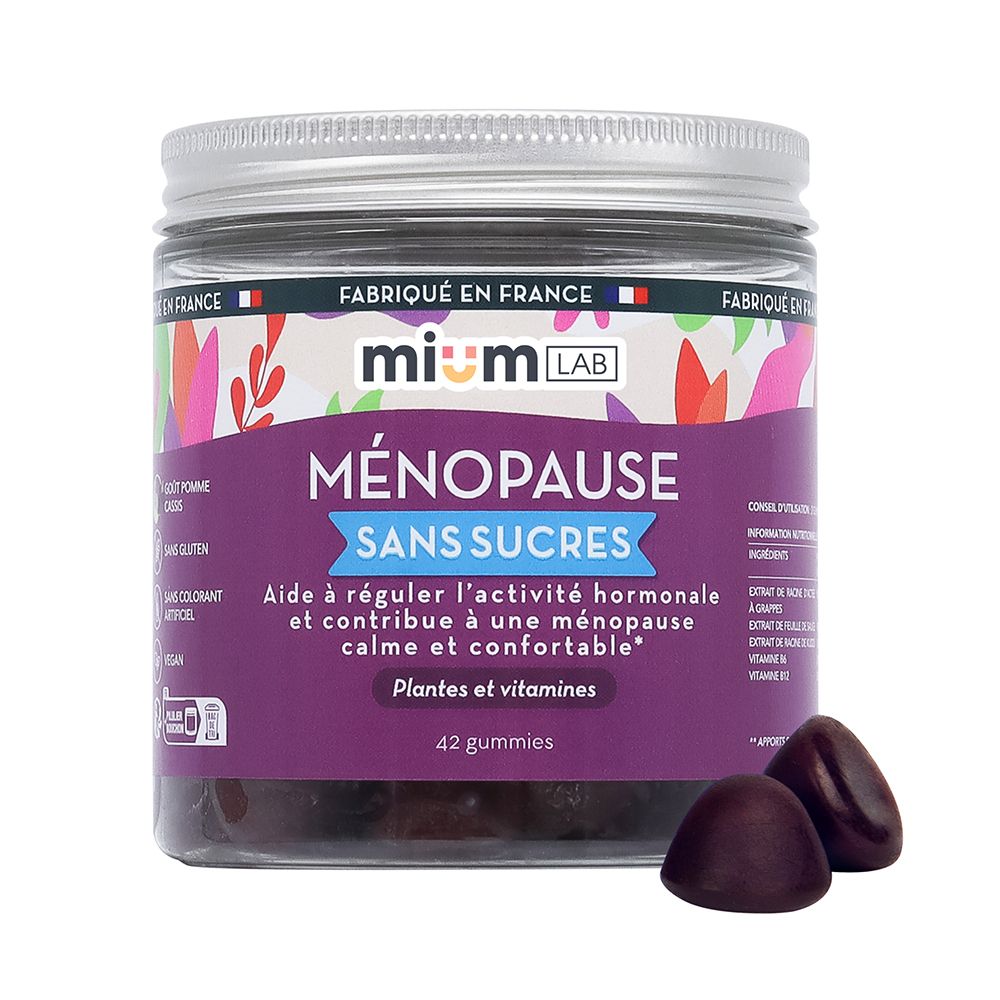 Pot de gummies et deux gummies. Inscription: Ménopause, sans sucres.