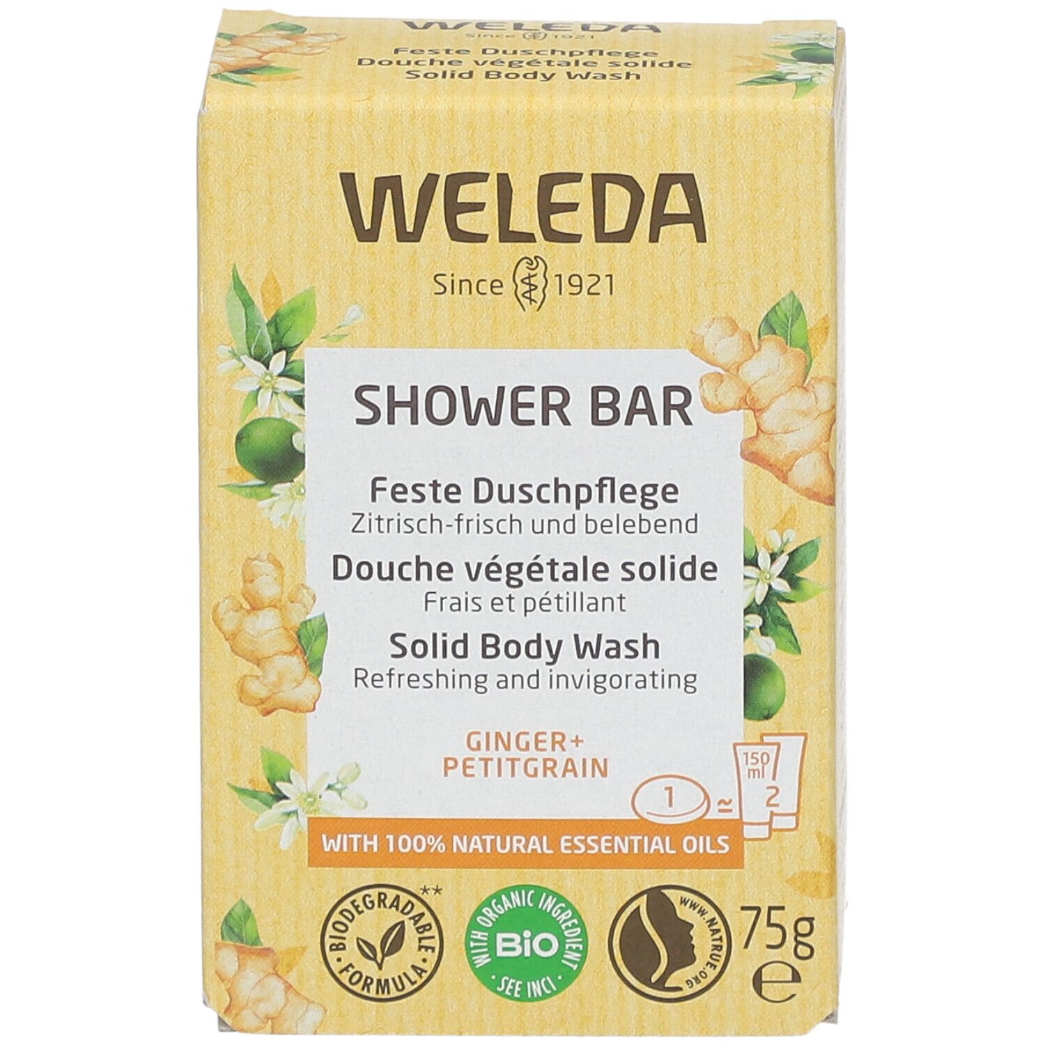 Gelbe Kartonverpackung. Aufschrift: WELEDA, SHOWER BAR, Feste Duschpflege, Ginger + Petitgrain. Mit Bio-Siegel und 75g.