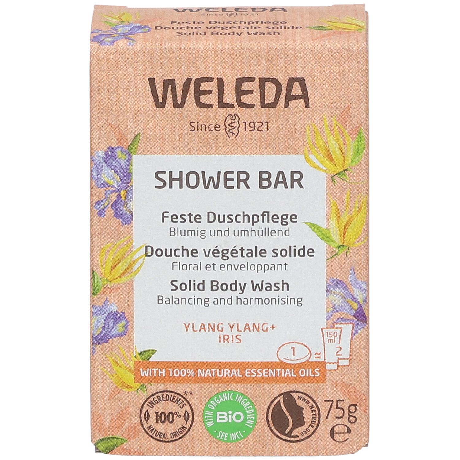 Boîte WELEDA. Inscription : SHOWER BAR, Douche végétale solide, Ylang Ylang + Iris. Avec 100% huiles essentielles naturelles. 75g.