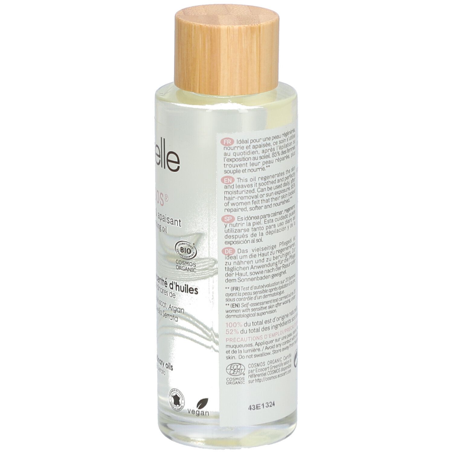 Dos du flacon en verre avec texte et logos. Bouchon en bois. Label Bio et logo Vegan. Texte multilingue.