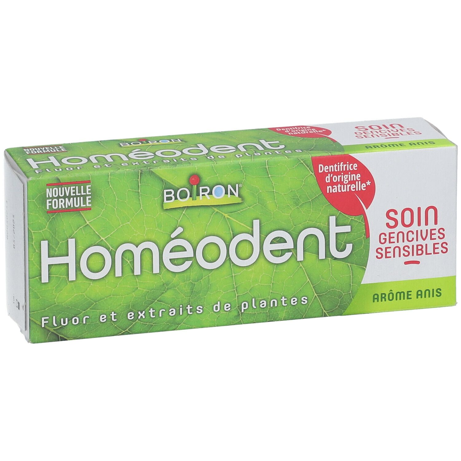 Homéodent-Verpackung, grüne Blätter, Text: Fluor und Pflanzenextrakte, Soin gencives sensibles, Aromatisierter Anis.