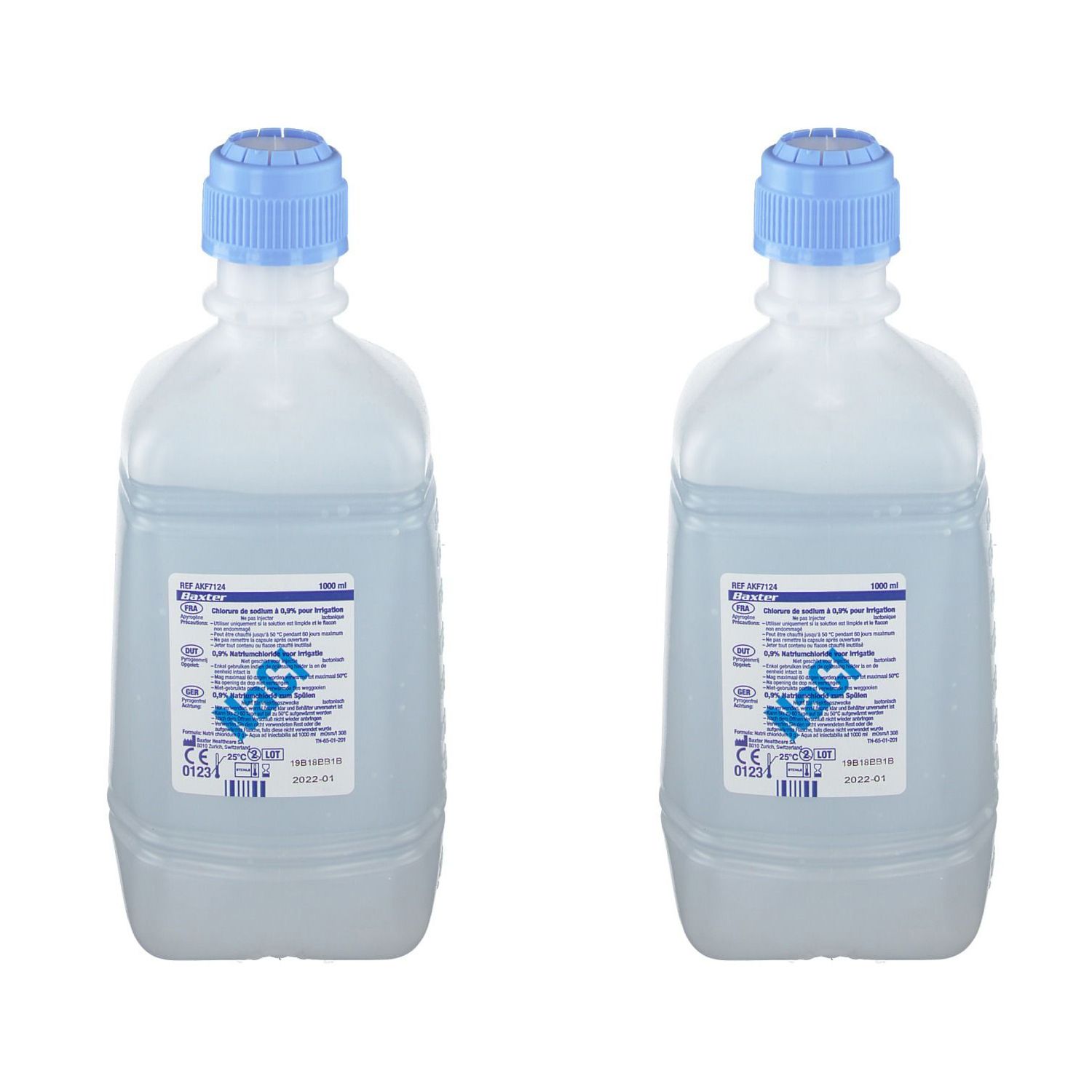 Deux flacons avec bouchons bleus. Étiquettes avec texte : NaCl. Liquide clair visible. Logo Baxter.