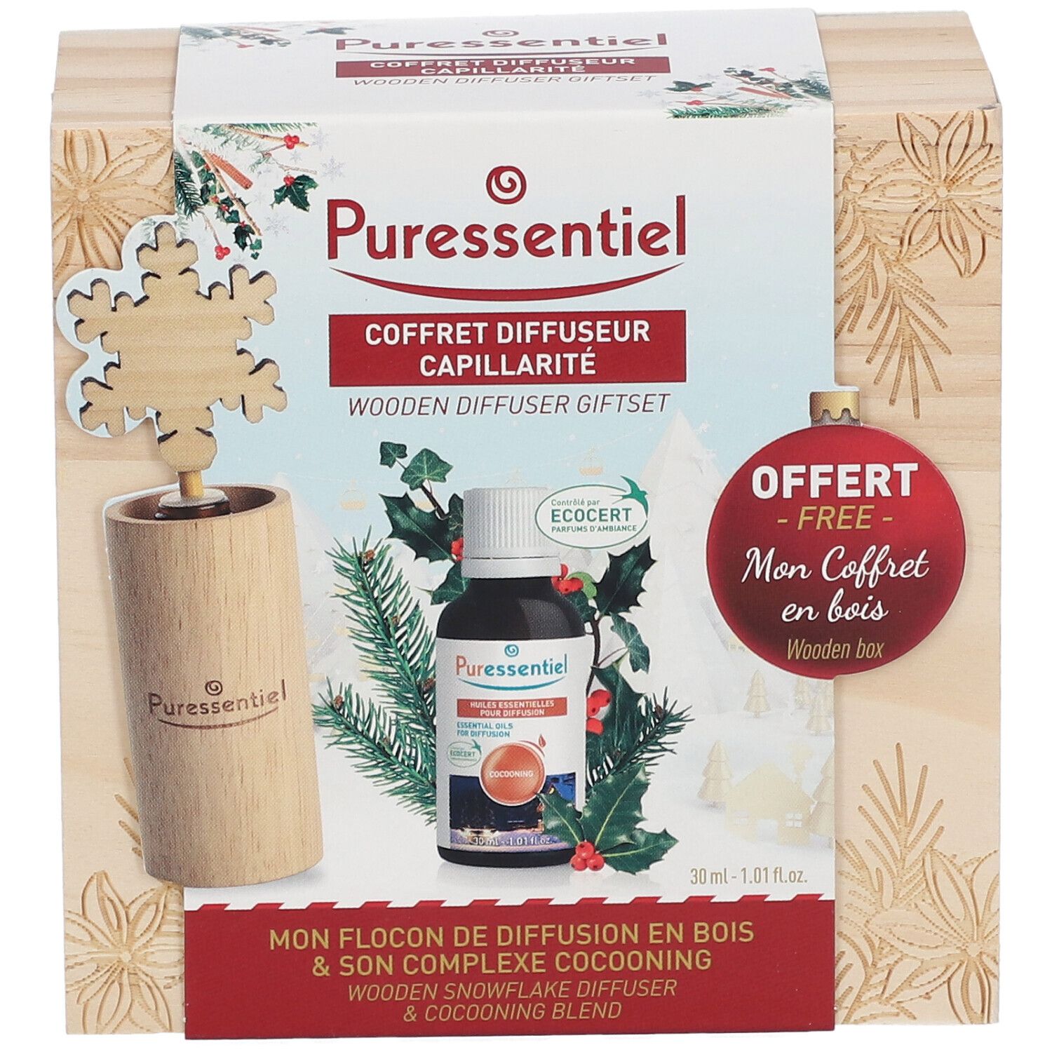 Coffret en bois avec diffuseur, flacon et décoration flocon. Logos "Puressentiel" et noms de produits.